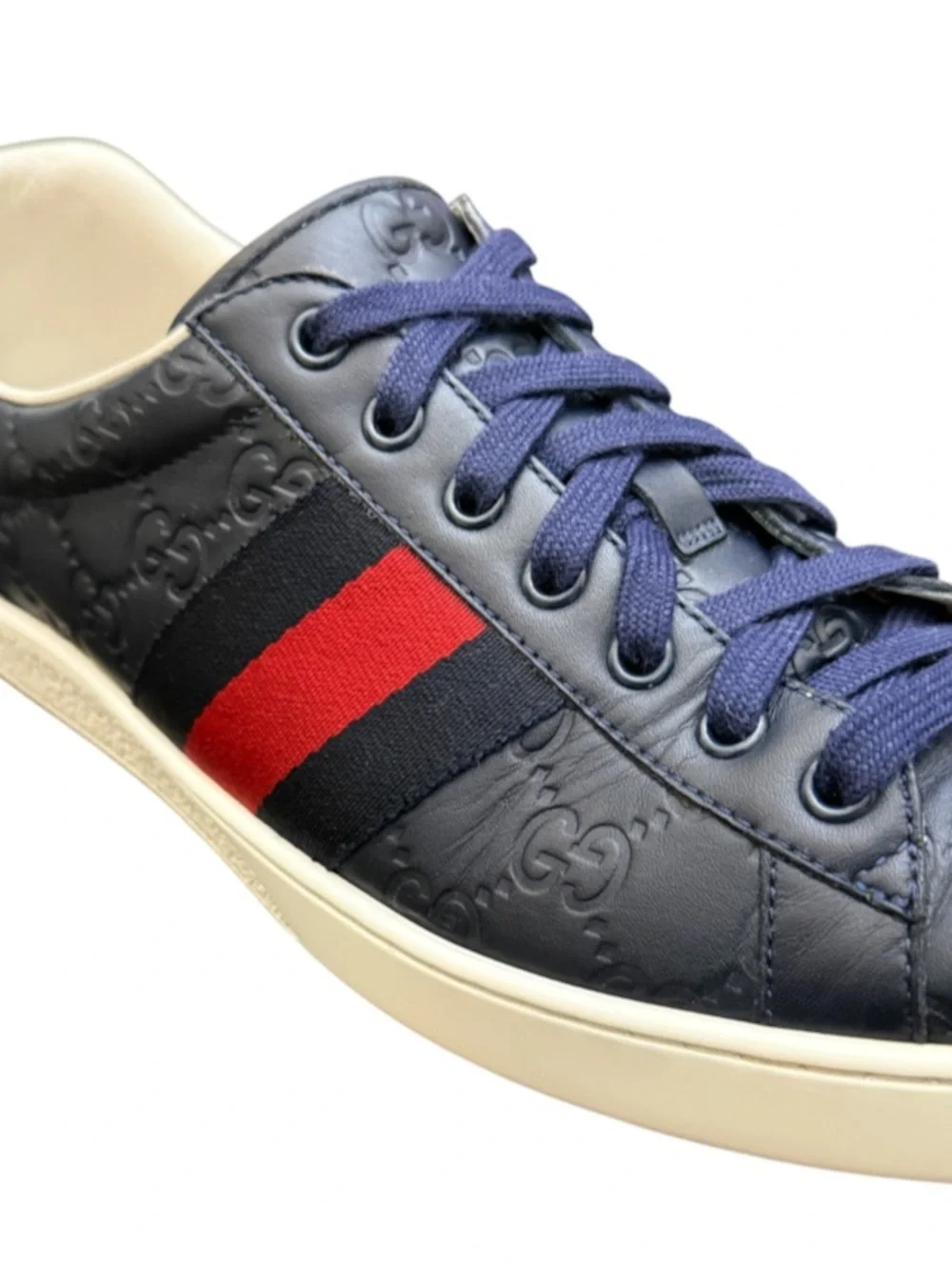 GUCCI - NAVY BLUE ALL LEATHER EMBOSSED MONOGRAM “ACE GG SUPREME” SNEAKERS